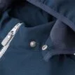 Närbild dragkedja på Reima Nurmes softshell overall (barn)