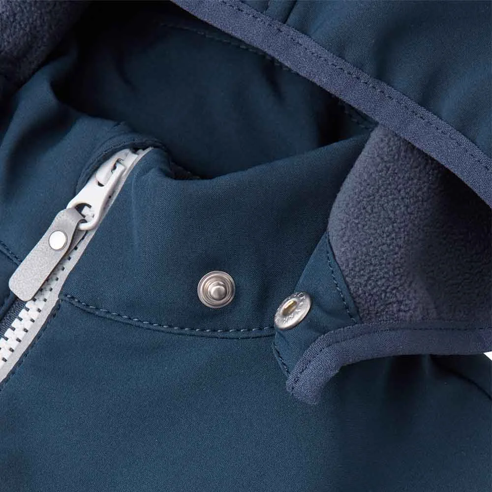 Närbild dragkedja på Reima Nurmes softshell overall (barn)