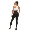 Röhnisch Thermal Tights (dam) bakifrån på en modell.