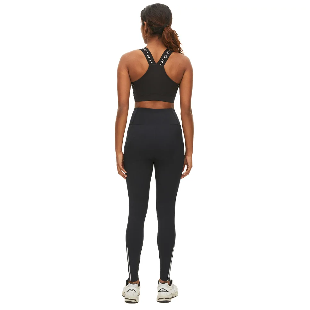 Röhnisch Rain Tights (dam) bakifrån på modell