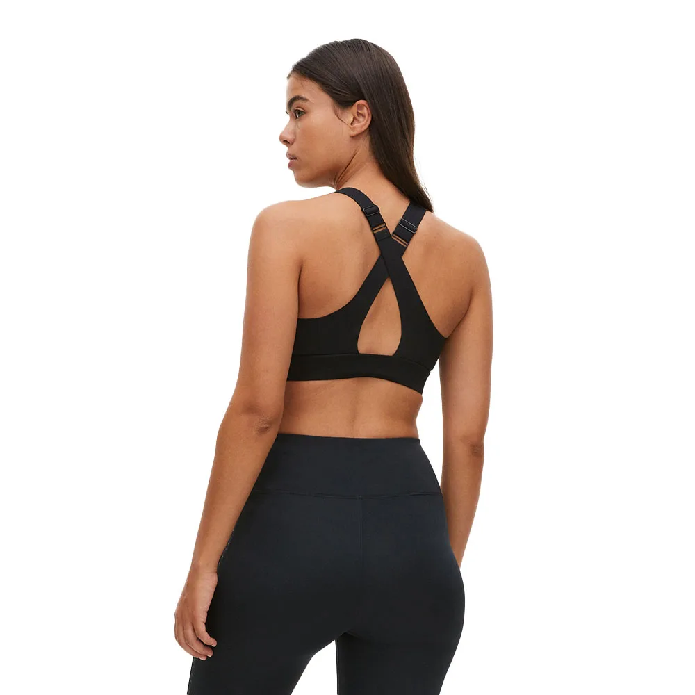 Röhnisch Zip Up Sportsbra (dam) bakifrån på modell.