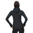 Free Motion Padded Jacket, Black som står med ryggen mot kameran