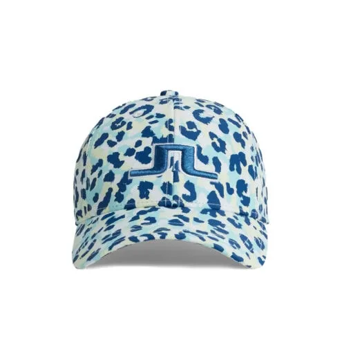 J.Lindeberg Arlene Cap keps (dam) i ett snyggt mönster med ett inbyggt pannband