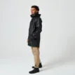 En skön och vattentät Tretorn Wings Plus Eco regnjacka (unisex) på en modell