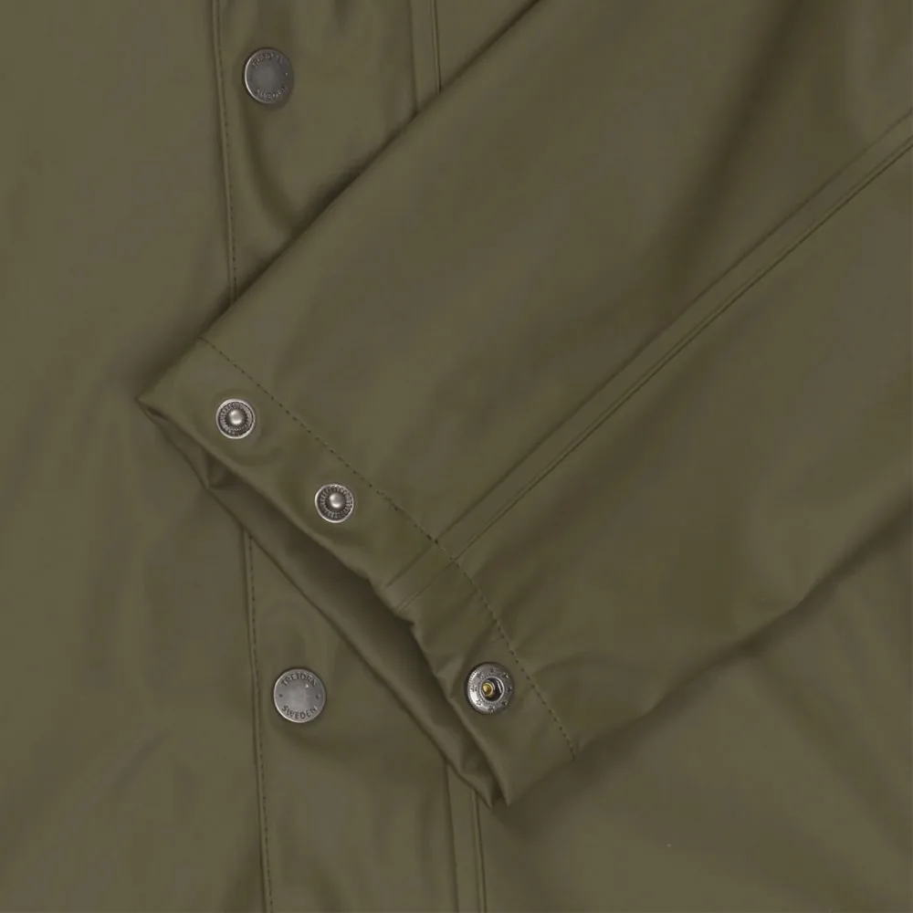Smart knäppning på En skön och vattentät Tretorn Wings Plus Eco regnjacka (unisex)