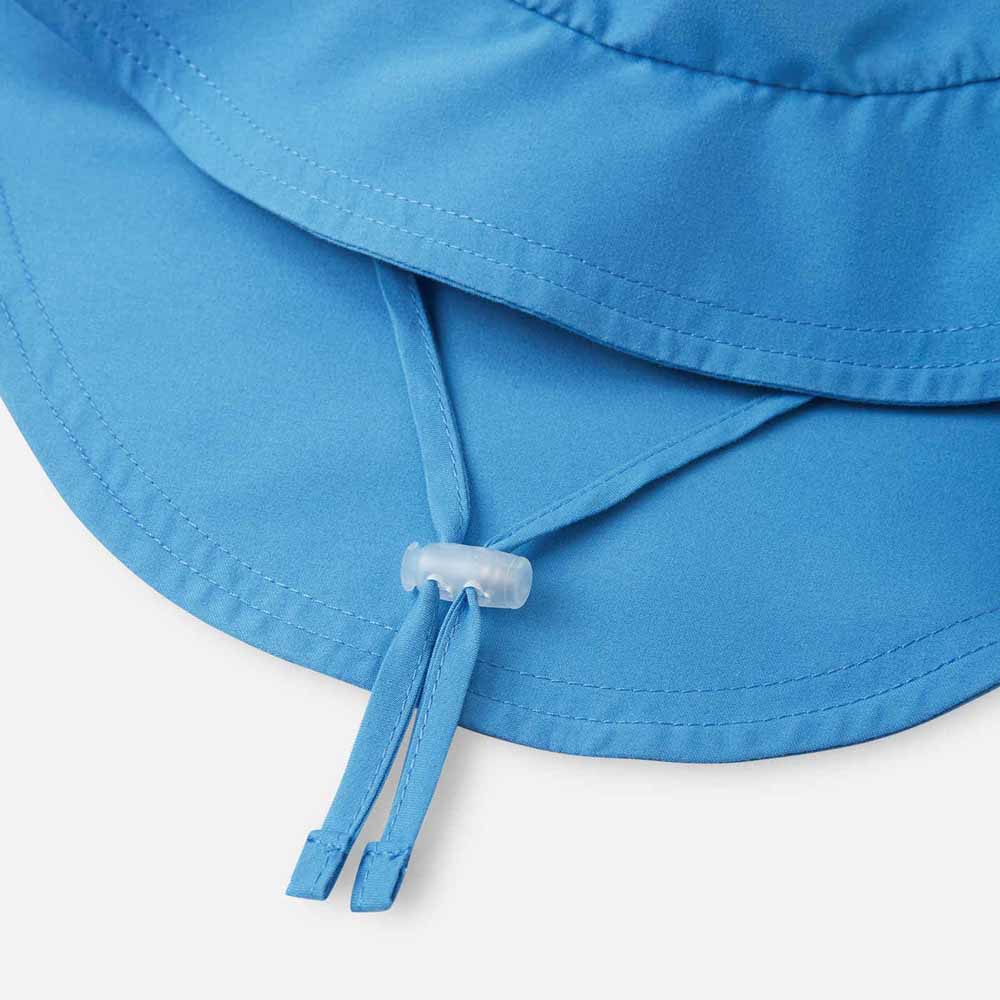 spänne på Reima Sunhat Rantsu solhatt (barn)