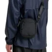 en svart Tretorn Crosspack axelväska (unisex)
