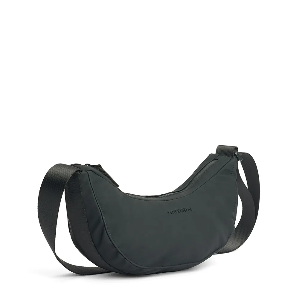 Tretorn PU Moon Bag axelväska (unisex) snett från sidan