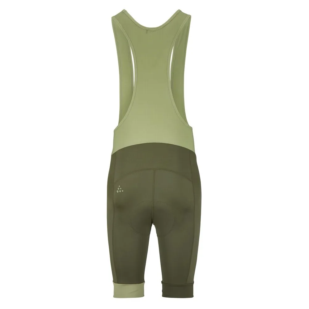baksida av en grön Craft Endur Bib Shorts C4 cykelshorts (herr)
