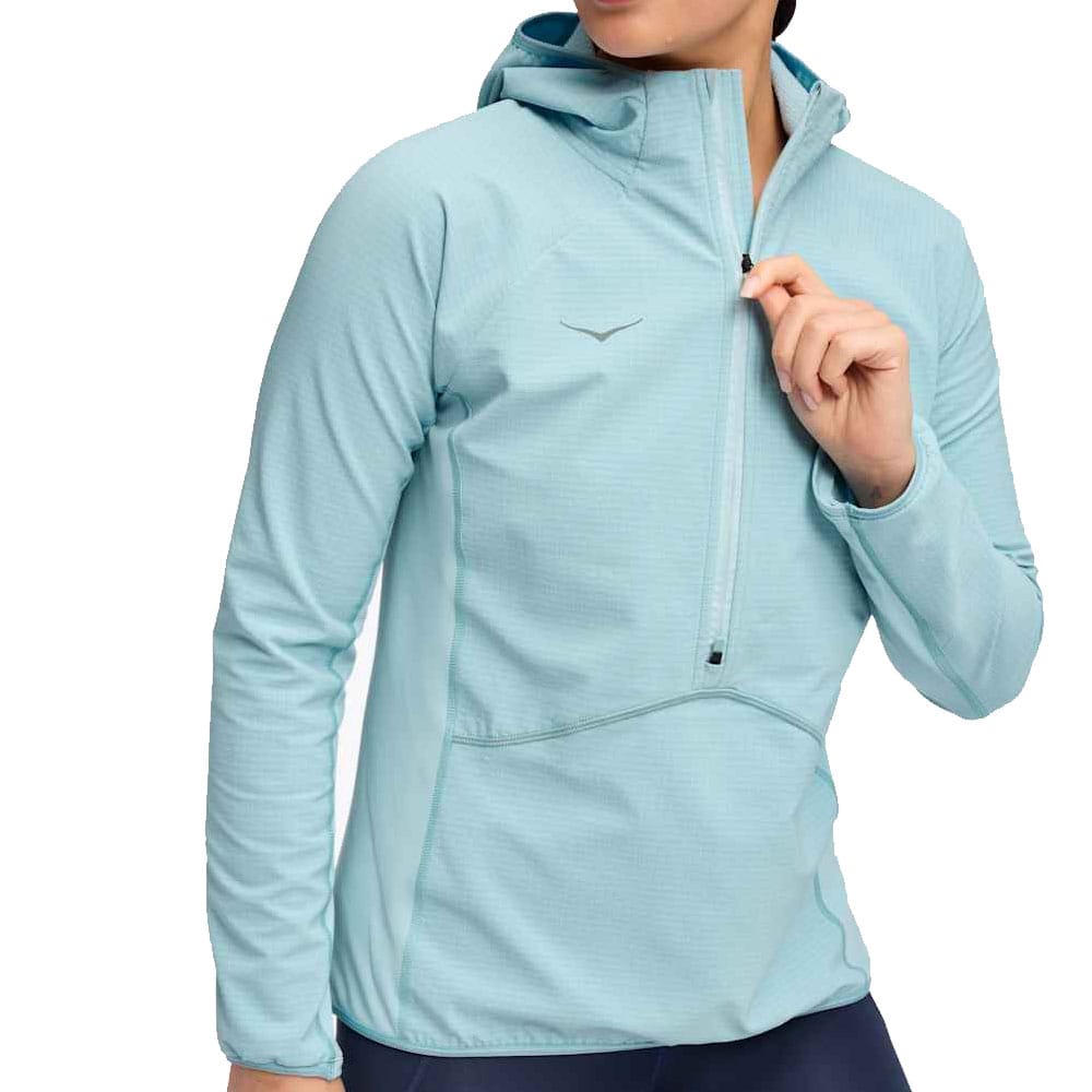 en blå Hoka Skyglow Half-Zip träningströja (dam)