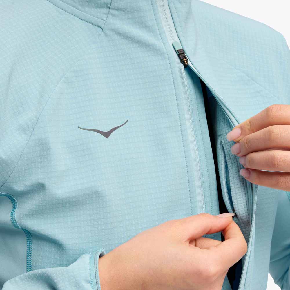 detaljer på Hoka Skyglow Half-Zip träningströja (dam)