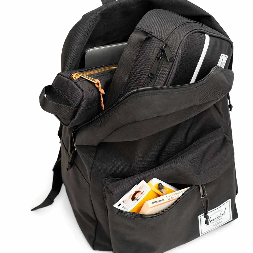en öppen Herschel Classic XL 30 L vardagsryggsäck (unisex) med saker i