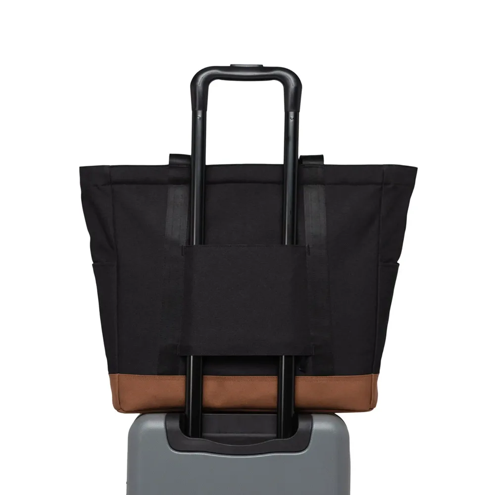 Herschel Heritage Tote väska 24,5 L (unisex) på en resväska