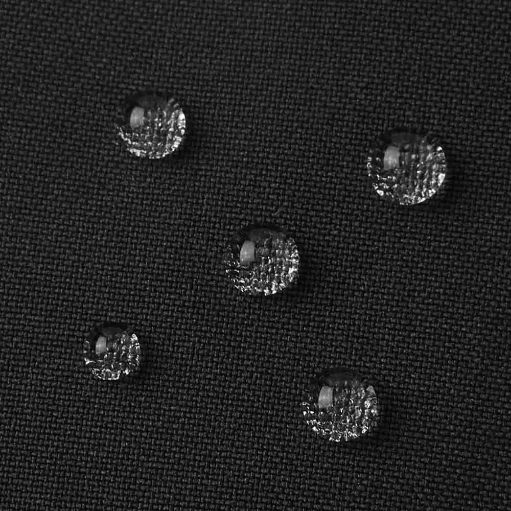 droppar på ett par Reima Osaten softshell vantar (barn) (2025)