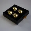 guldig Ljusluvan Automatisk ljussläckare (4-pack) i en presentask