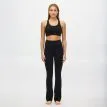 en modell bär Röhnisch Legacy Flare High Waist Tights yogabyxor (dam)