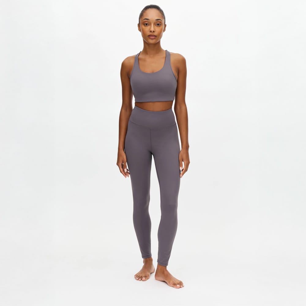 en model bär Röhnisch Legacy High Waist Tights träningstights (dam)