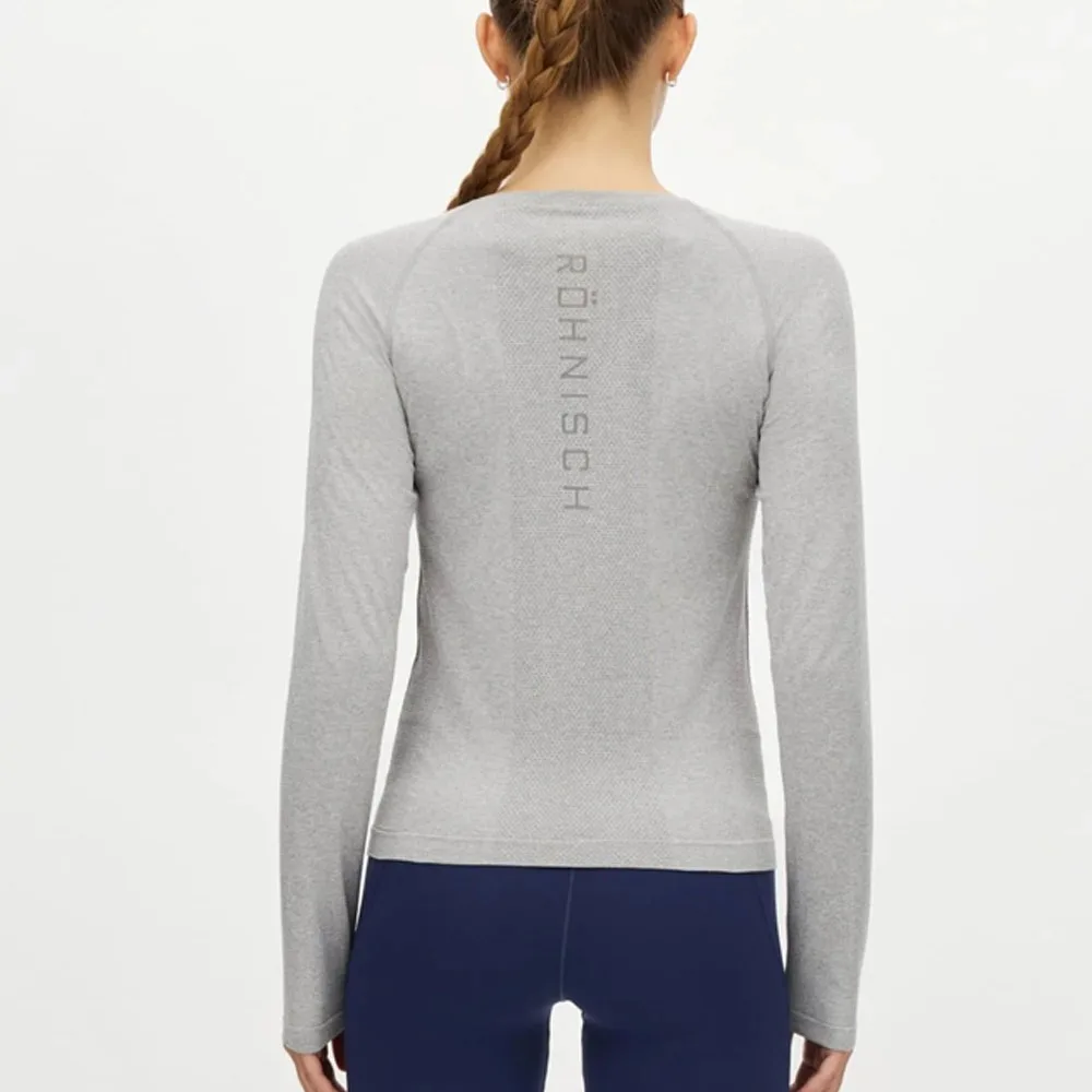 baksida av Röhnisch Seamless Flex Long Sleeve träningströja (dam)