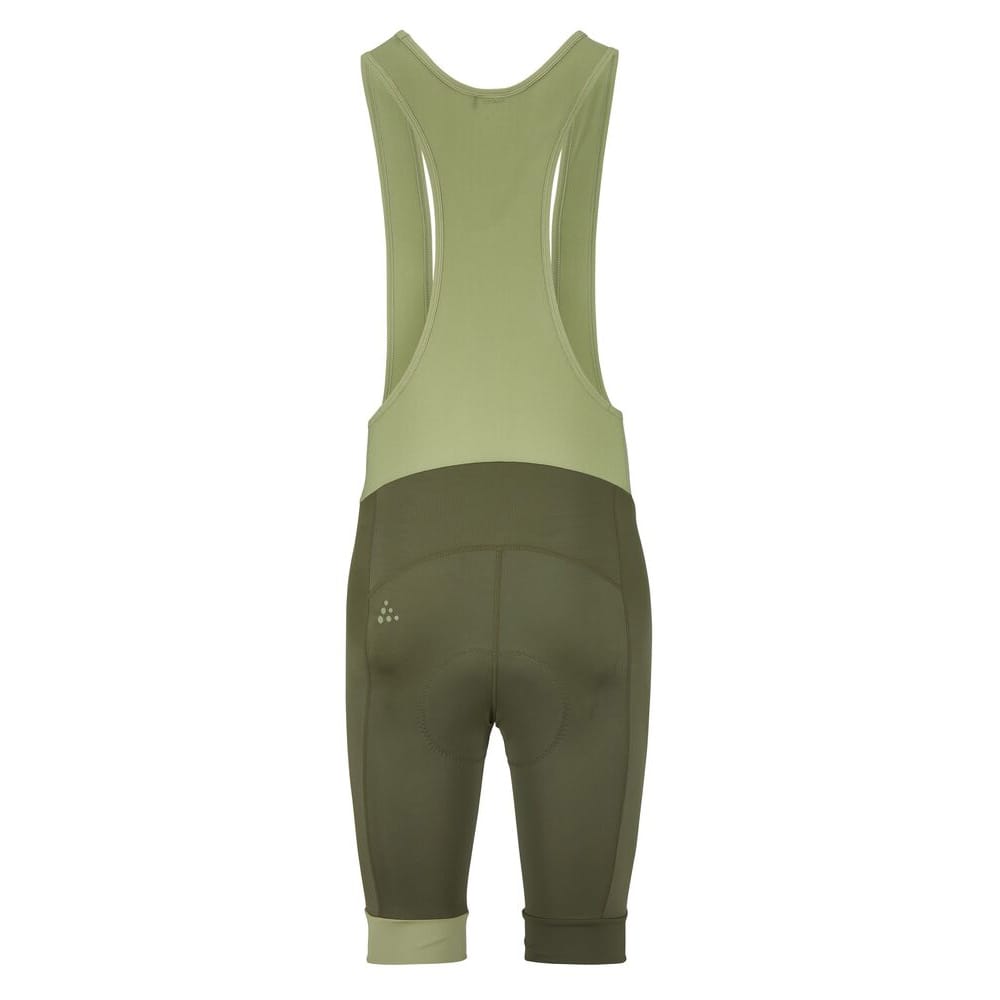 baksida av en grön Craft Endur Bib Shorts C4 cykelshorts (herr)