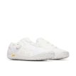ett par vita Merrell Vapor Glove 6 Boa löparskor (dam)