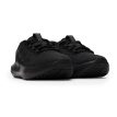 ett par Under Armour UA Charged Surge 4 löparskor (dam)