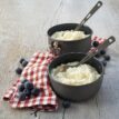 Glutenfri rispudding med vaniljsmak från Trek'N Eat upplagt i två skålar.