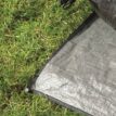 Outwell Shalecrest Footprint utplacerad på gräsmatta.